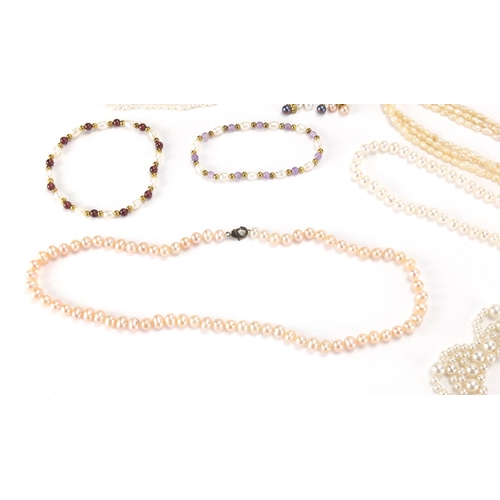 2746 - Freshwater and simulated pearl necklaces and earrings including Lotus, some with silver clasps