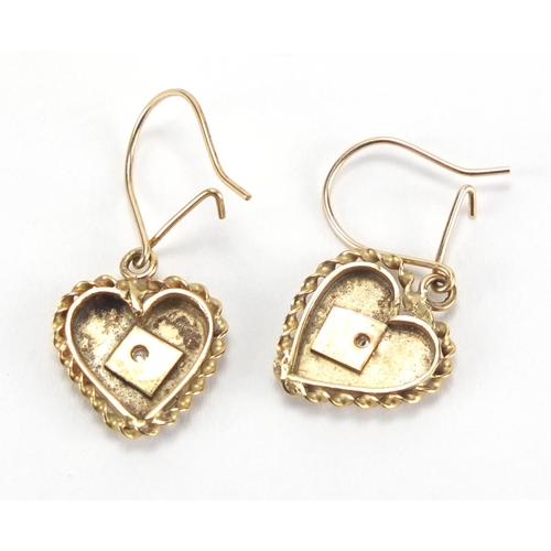 2726 - Pair of unmarked gold diamond love heart earrings, 3cm in length, approximate weight 2.3g