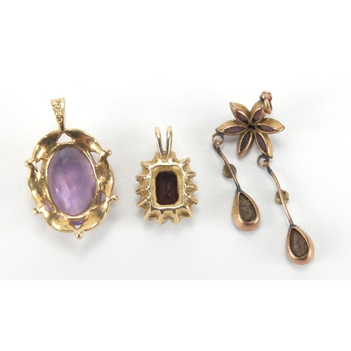 2706 - Three 9ct gold pendants, set with assorted stones including garnet and seed pearl, the largest 3.5cm... 