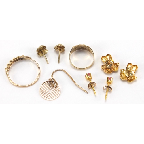 2716 - Three pairs of 9ct gold earrings, two 9ct gold rings and one other earring, approximate weight 3.0g