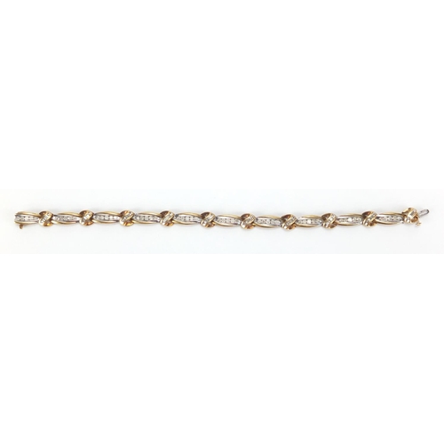 2665 - 10ct two tone gold diamond bracelet, 19cm in length, approximate weight 12.5g