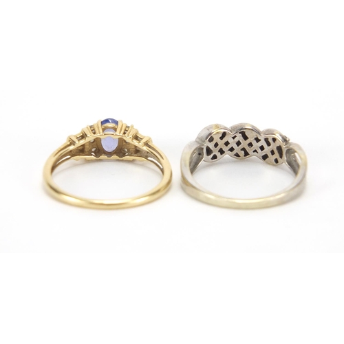 2739 - 9ct gold tanzanite and diamond ring and an unmarked gold black and clear stone crossover ring, sizes... 