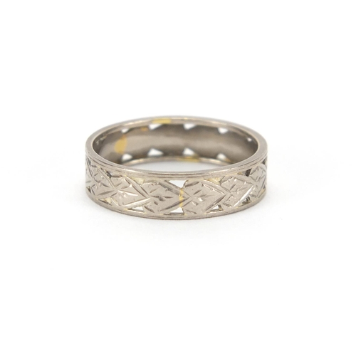 2667 - 18ct white gold wedding band with engraved and pierced decoration, size M, approximate weight 3.0g