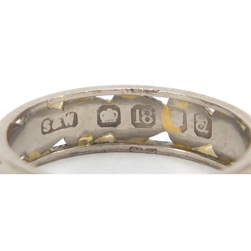 2667 - 18ct white gold wedding band with engraved and pierced decoration, size M, approximate weight 3.0g