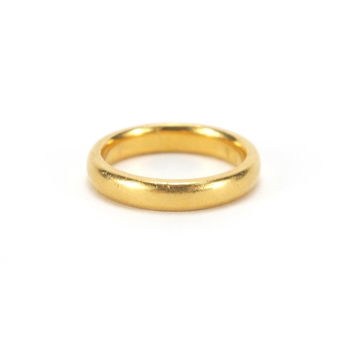 2583 - 22ct gold wedding band, size K, approximate weight 6.2g