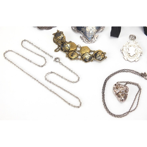 2790 - Mostly silver jewellery including sports jewels, ingot pendant and Siam brooch, approximate weight 1... 