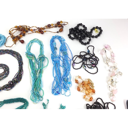 2748 - Costume jewellery necklaces including garnet, amethyst and other polished stones