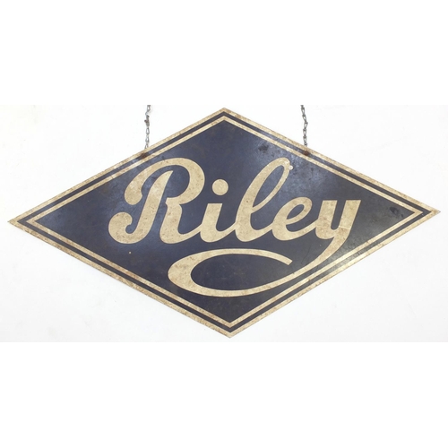 140 - Two automobilia interest dealer hangings, Riley and Wolseley, the largest 64.5cm wide