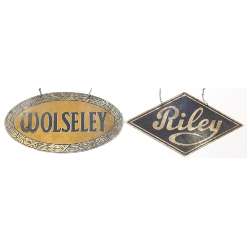 140 - Two automobilia interest dealer hangings, Riley and Wolseley, the largest 64.5cm wide