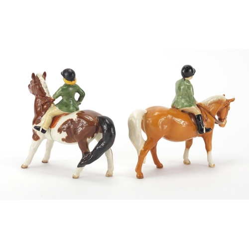 2419 - Two Beswick children on ponies, the largest 14cm high