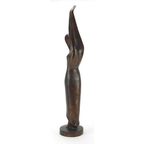 2380 - Modernist bronze study of a stylised female with upstretched arms, 49.5cm high