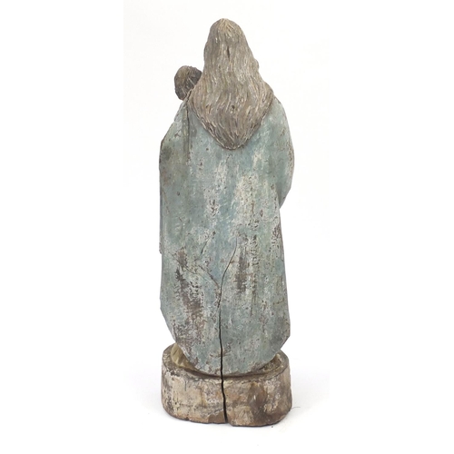 2071 - Floor standing carved wooden model of Madonna and child,  hand painted, 103cm high