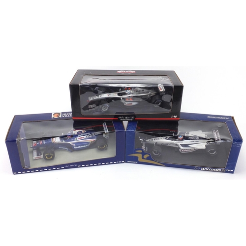 675 - Three Paul's model art die cast Formula 1 racing cars, scale 1:18 including two minichamps
