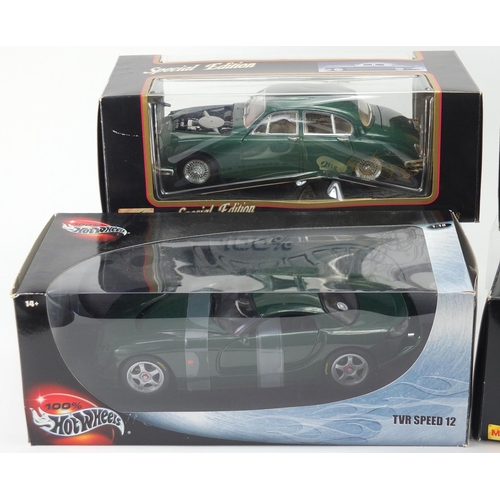 686 - Three Maisto die cast vehicles and a Hot Wheels example, including three Jaguars, with boxes scale 1... 
