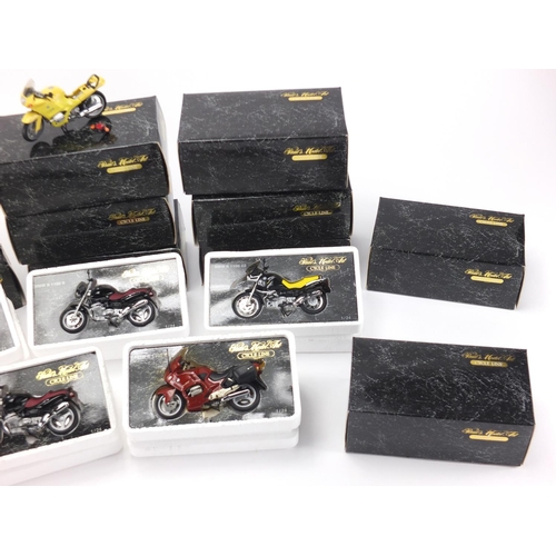 679 - Twelve Pauls model art cycle line die cast BMW motorbikes, with boxes scale 1:24