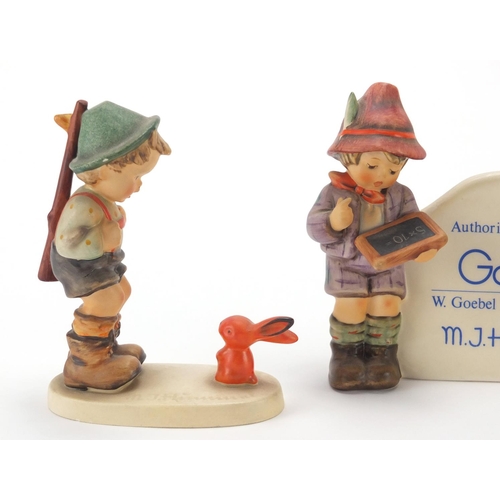 2424 - Three Goebel Hummel figures including hand painted porcelain figures and a authorised retailer plaqu... 