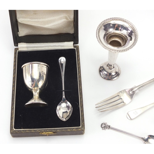 2548 - Silver items including Christening egg cup and spoon, Victorian fork, teaspoons and bud vase, variou... 