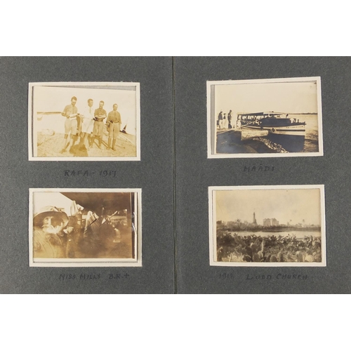 186 - Early 20th century World War I black and white photographs arranged in two albums, mostly depicting ... 