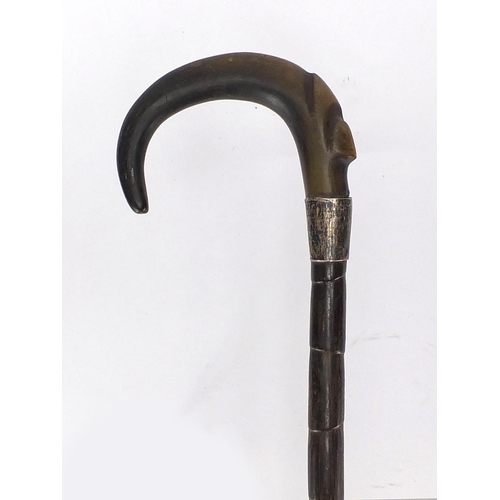 107 - Horn handed bamboo walking stick with silver collar, possibly rhino horn, 87cm in length