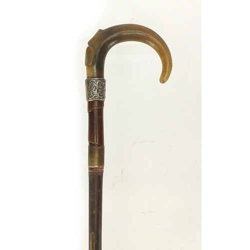 108 - Horn handled walking stick with silver collar and brass ferrule, possibly rhino horn, 91cm in length