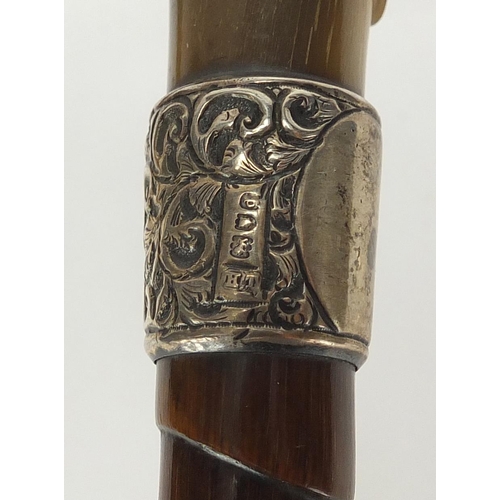 108 - Horn handled walking stick with silver collar and brass ferrule, possibly rhino horn, 91cm in length