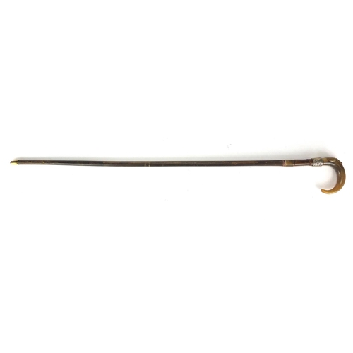 108 - Horn handled walking stick with silver collar and brass ferrule, possibly rhino horn, 91cm in length