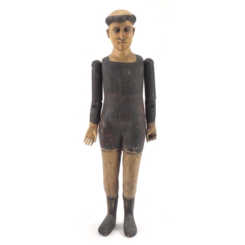 76 - Spanish colonial polychrome painted carved wooden mannequin, with beaded glass eyes, 65cm in length