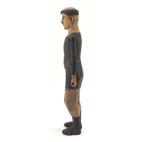 76 - Spanish colonial polychrome painted carved wooden mannequin, with beaded glass eyes, 65cm in length