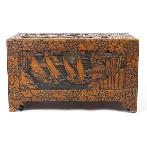 2079 - Rectangular Chinese Camphorwood chest with twin handles carved with junks and flowers, 56.6cm H x 10... 