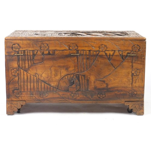 2079 - Rectangular Chinese Camphorwood chest with twin handles carved with junks and flowers, 56.6cm H x 10... 