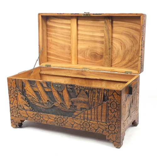 2079 - Rectangular Chinese Camphorwood chest with twin handles carved with junks and flowers, 56.6cm H x 10... 