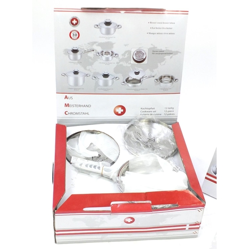 2127 - As new Swiss twelve piece chrome cookware set, with box