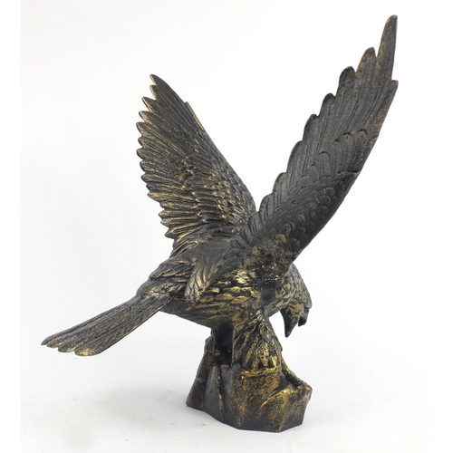 2124 - Large bronzed metal model of a swopping eagle, 63cm high