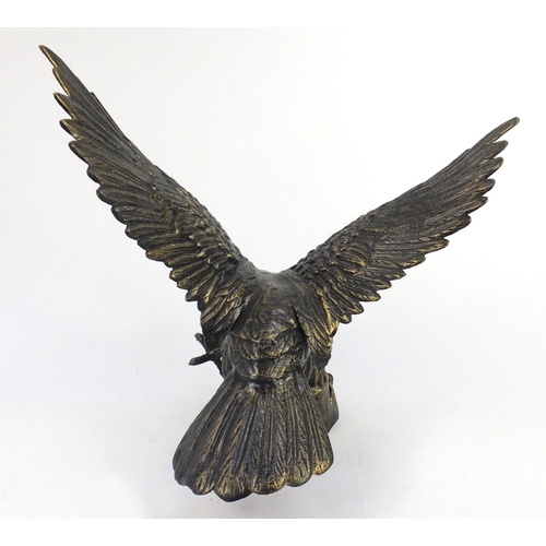 2124 - Large bronzed metal model of a swopping eagle, 63cm high