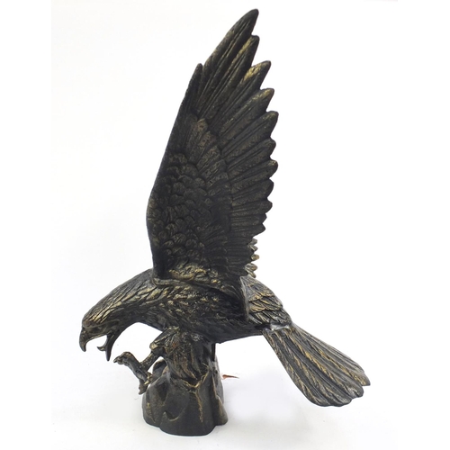 2124 - Large bronzed metal model of a swopping eagle, 63cm high