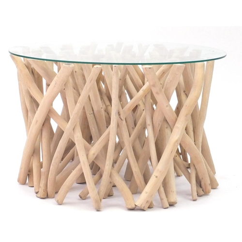 2061 - Naturalistic wooden coffee table with glass top, 40cm high x 65cm in diameter