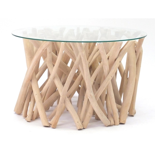 2061 - Naturalistic wooden coffee table with glass top, 40cm high x 65cm in diameter