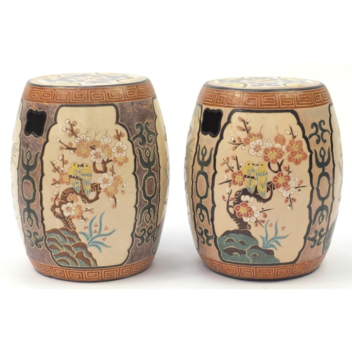 2091 - Pair of Asian ceramic garden seats in the form of drums, each hand painted and incised with panels o... 