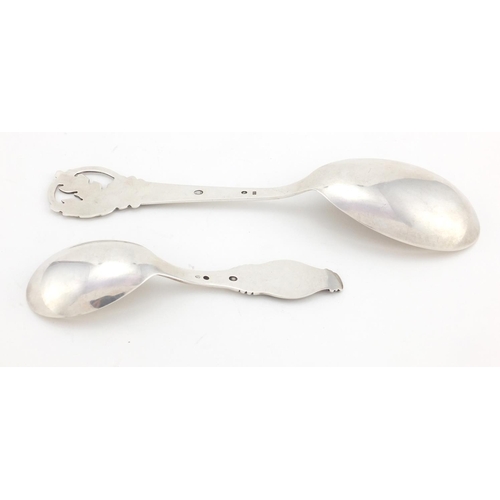 2553 - Two Danish silver spoons, one with acorn finial, the largest 20cm in length, approximate weight 78.5... 