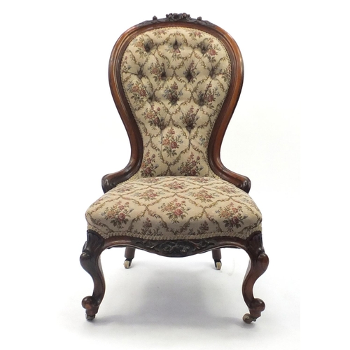 2051 - Victorian rosewood bedroom chair, with floral button back upholstery carved with acorns, 94cm high