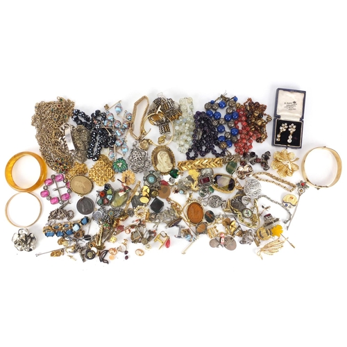 2812 - Costume jewellery including bangles, polished stone necklaces, brooches and cameos