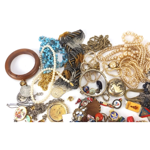 2810 - Costume jewellery including bangles, simulated pearls, polished stone necklaces and brooches