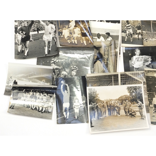 157 - Collection of Football ephemera and press release black and white football photographs, including th... 