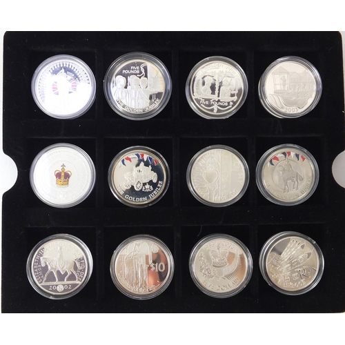 254 - Queen Elizabeth II Golden Jubilee collection comprising twenty four silver proof coins, some with ce... 