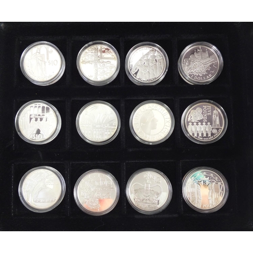 254 - Queen Elizabeth II Golden Jubilee collection comprising twenty four silver proof coins, some with ce... 