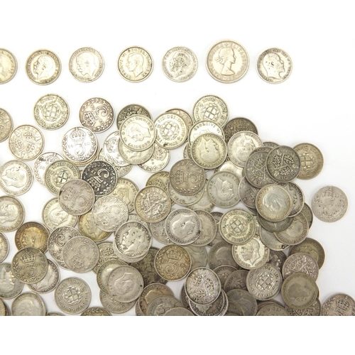 242 - Victorian and later British coinage three pence's and six pence's, approximate weight 490.0g