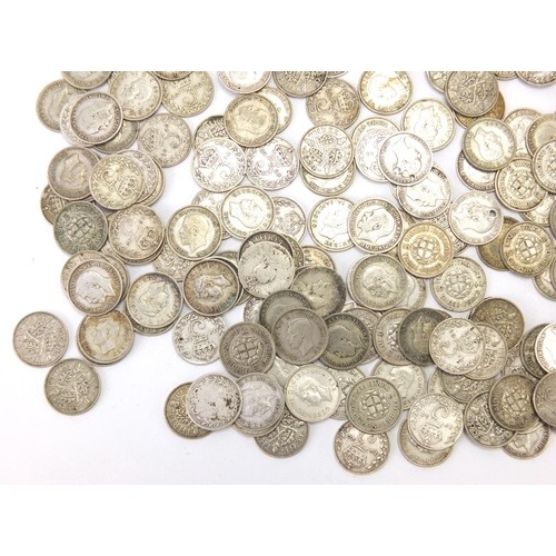 242 - Victorian and later British coinage three pence's and six pence's, approximate weight 490.0g