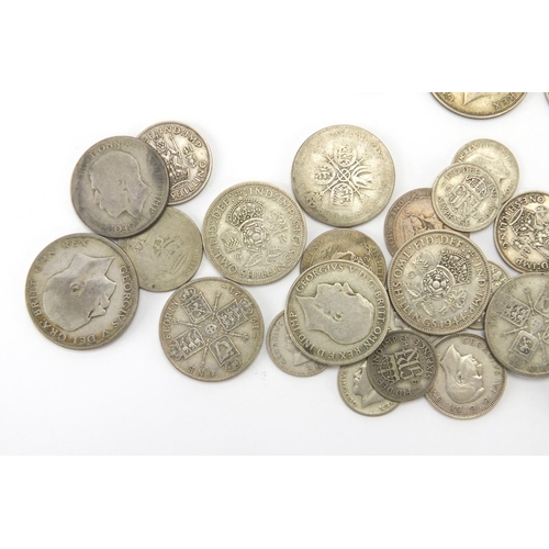 241 - British pre decimal pre 1947 coinage including half crowns and shillings, approximate weight 475.0g