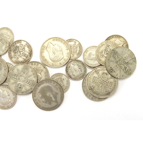 241 - British pre decimal pre 1947 coinage including half crowns and shillings, approximate weight 475.0g