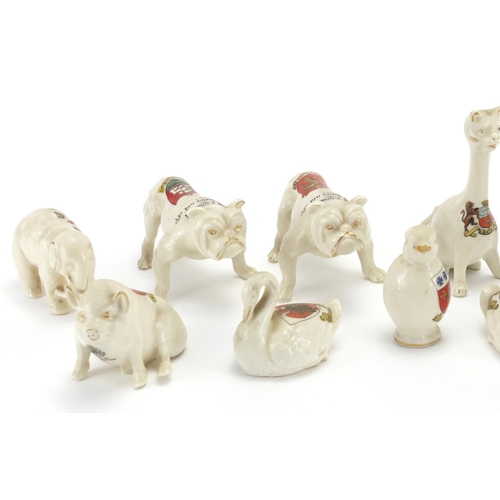 2279 - Crested china including a pair of Arcadian bulldogs and a Carlton elephant, various crests, the larg... 